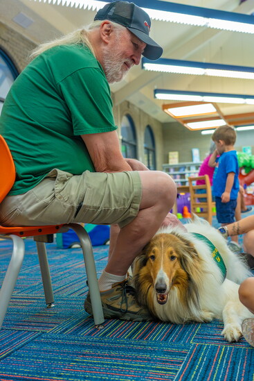 Ken Wegenhart & his collie Eoin on one of their weekly visits to the children's section of the Madeira Public Library.