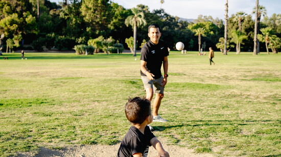 Coach Joel teaching baseball