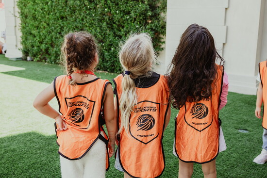 Kids in their Children’s Sports Academy jerseys