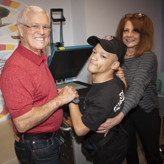 Coach and Pedro making Eagles shirts with Kathryn