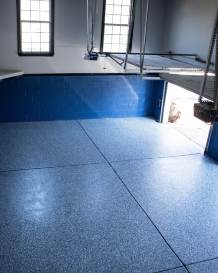 Custom floor coating makes all the difference in garage rebuilds.