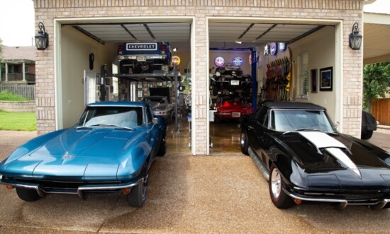 An exterior view of a custom garage that's perfect for a car enthusiast.
