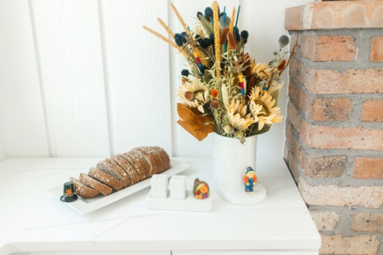 Nora Fleming break tray, salt and pepper shakers, and utensil crock.