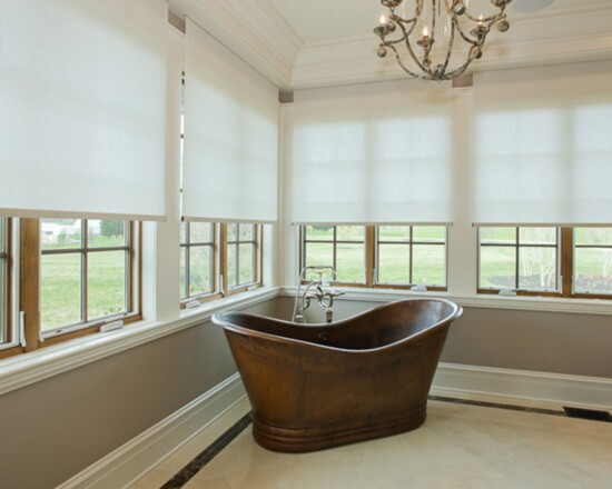 Automated shades lighten and regulate the room