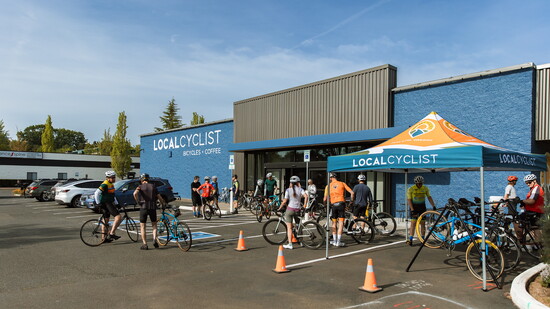 Cyclist gather outside the building for a ride 