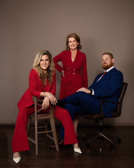 Briana Prucha, Lynn Wammel, and Andrew Prucha.