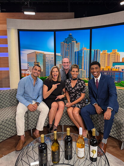 Malek and Jennifer on the set of Atlanta News First. 