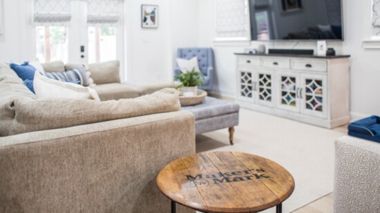 The basement is great for entertaining with doors leading out to an outdoor patio for additional space.