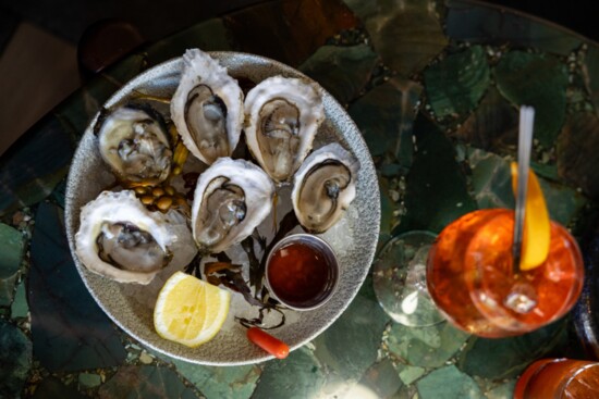 Oysters with hot sauce, lemon and mignonette