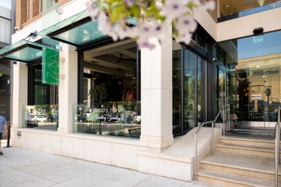 Street-side windows fold up for breezes and views.