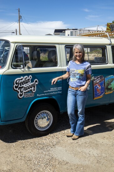 Michelle Moreau Keener poses with Georgie Girl, her VW tour bus.