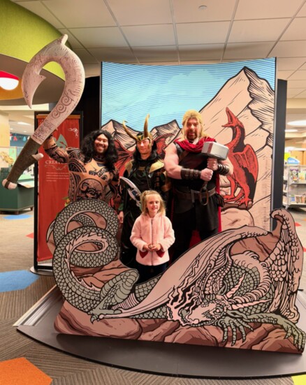 Young patron with costumed heroes Maui, Loki, and Thor on Opening Day of the Mythic Creatures Exhibit. Photo: Jennifer Nickels.