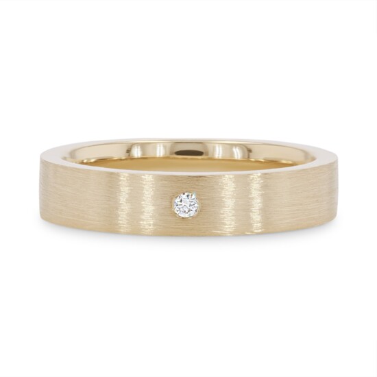 Inlay Matte Diamond Band is a sleek, four-millimeter wide matte band that holds a single round brilliant cut diamond weighing 0.02 carats diamondsdirect.co $750