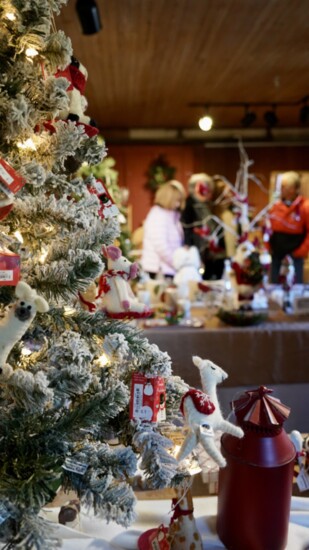 Shoppers mingle at the Holiday Boutique in the Barn at Keeler Tavern Museum & History Center