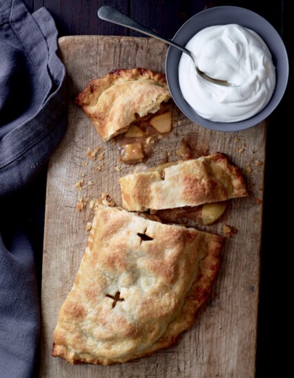 Woodier's half-moon-shaped apple pie brims with juicy apples and the traditional holiday flavors of cinnamon and nutmeg. Photo: Leigh Beisch Photography