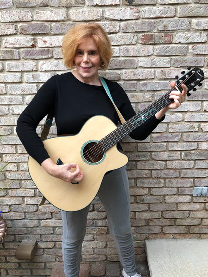 Jan Jones from Plymouth, Michigan just received her new Concert acoustic custom Pimentel guitar.