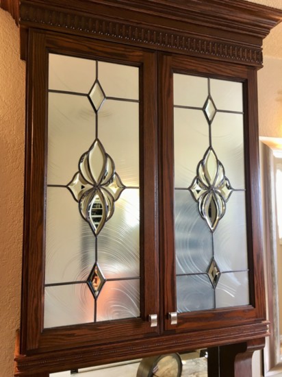 Beveled and etched glass is a versatile and attractive concealer of cabinet items or to prevent strangers from seeing into the front windows of the home.