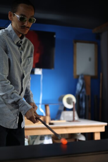 Michael Pinedo Jr. spinning hot glass