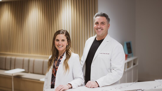 Dr. Tasha Hall and Dr. Andrew Raber with Hallmark Orthodontics