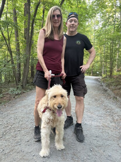 Jade happily walks on with his owners throughout the park