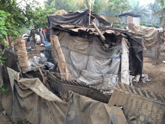 A typical home in many of the villages or garbage dumps we work in.