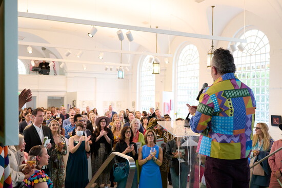Executive Director Duvian Montoya addresses the crowd during the live auction at the 2024 Arts Bash. Photo by Jerri Graham.