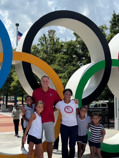 Dominque and family visiting Olymic park 