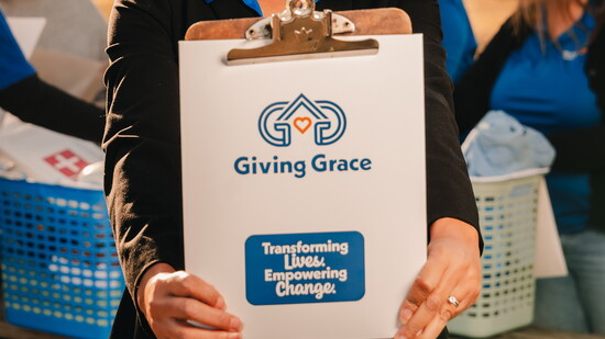 Chief Development Officer, Samantha Sims, highlighting the Giving Grace logo.