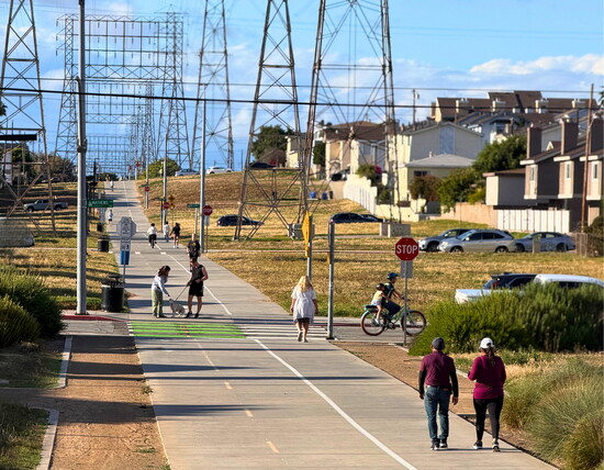 Locals out for an afternoon stroll and exercise on the Greenway.