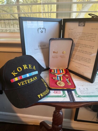 Metals and cap from the Korean War Yovino earned while deployed in 1952. 
