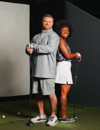 Shane Ritch and Alicia McDaniel wearing items from their pro shop.