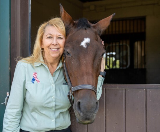 Janet Brennan and special equine Irish (forehead star in shape of Ireland). Irish was the matriarch of the herd and inspiration for Shamrock Reins.