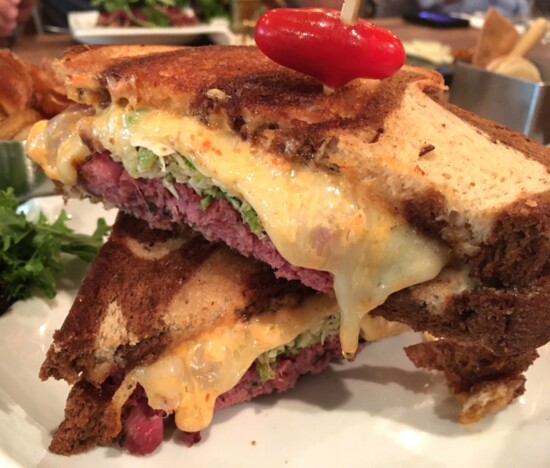 The V Reuben at Vaudeville features artisanal pastrami, Brussels sprout kraut, melted Gruyer, wholegrain mustard and Thousand Island on marbled rye.