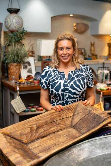 Dorothy Sarris among her imports at Fish Market