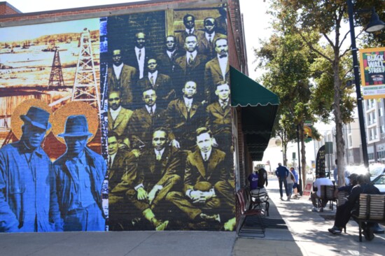 Colorful murals remind passers-by of a long-gone era. Photo by Nancy Hermann. 