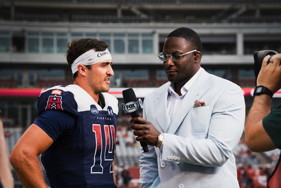 Houston Roughnecks quarterback Nolan Henderson and UFL sideline reporter Devin Gardner. 