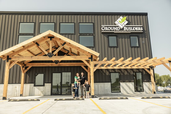 Ground Builders owners Jason and Hannah Porto, pictured with their children, at their brand-new showroom in Waterloo.