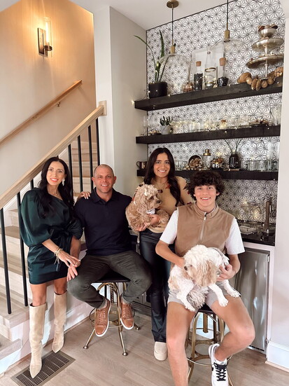 Family First, Always: Jason and Melissa Drum with children Kaiden and Makayla—the names behind K&M Floors—and their two beloved pups.