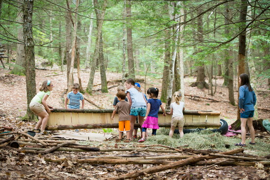 Outdoor play can help children gain social interaction, gross motor skills, fine motor skills, and more. Photo: TimberNook