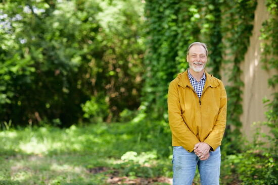 Dr. Tom Gallaher on his land. Photo: Beall and Thomas