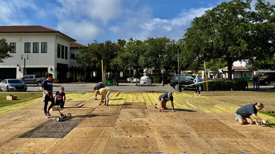 Habitat for Humanity’s board of directors (above) prepares for the South Walton Beaches Wine & Food Festival fundraiser.