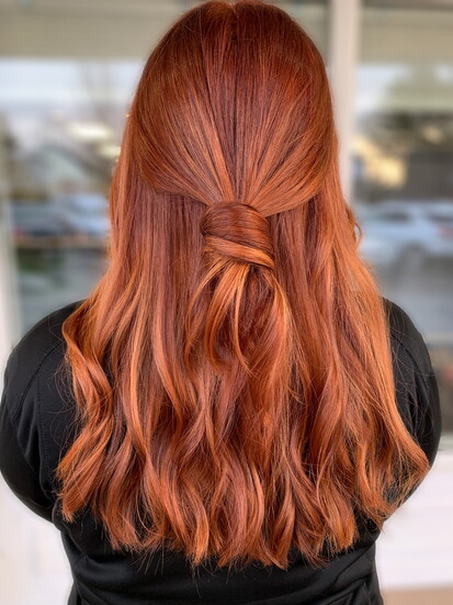 A Hair Today client with a stunning copper-red balayage by Gina