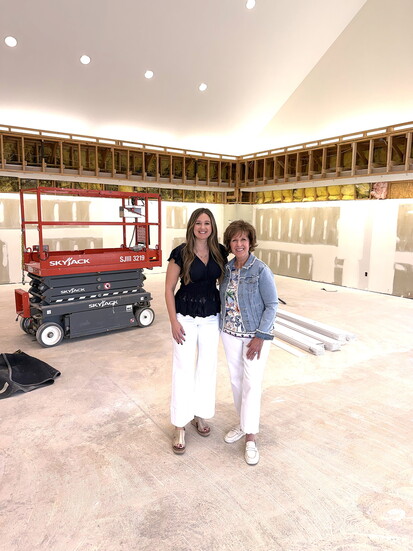 Sara Brianne Slaughter (on left) with mother Teresa Dillard in the shop being renovated. 