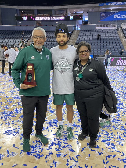 Trevor with his parents, Sterling & Pat, after winning the Elite Eight