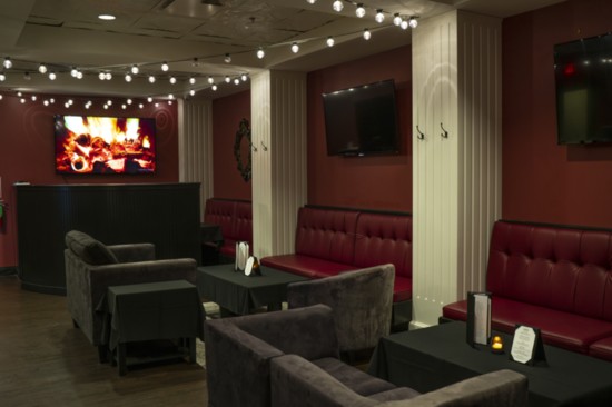 Relax with an aged cigar and whiskey at Cardinal Club's exclusive cigar bar.