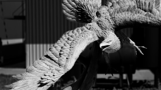 A soaring eagle sculpture, donated by a board member, is emblematic of patriotism and service.