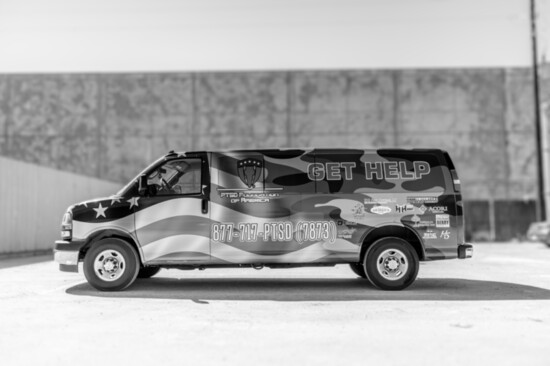 Awareness on wheels: a Camp Hope Van, eye-catchingly wrapped with contact information. 