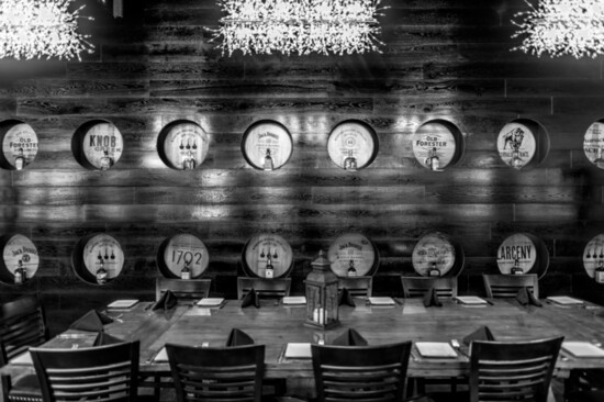 Barrel lids adorn the wall of the Federal American Grill, each brand served at the bar.