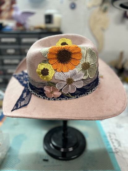 Florals, lace, and silver chains add flair.