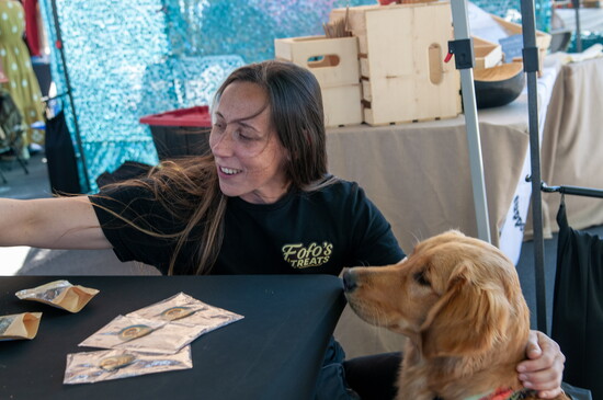 Owner of Fofo's Treats, Ashley Grubbs, offering healthy, homemade dog treats at a recent farmers market in Bend.